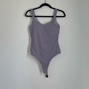 Klassy Network Lavender Bodysuit